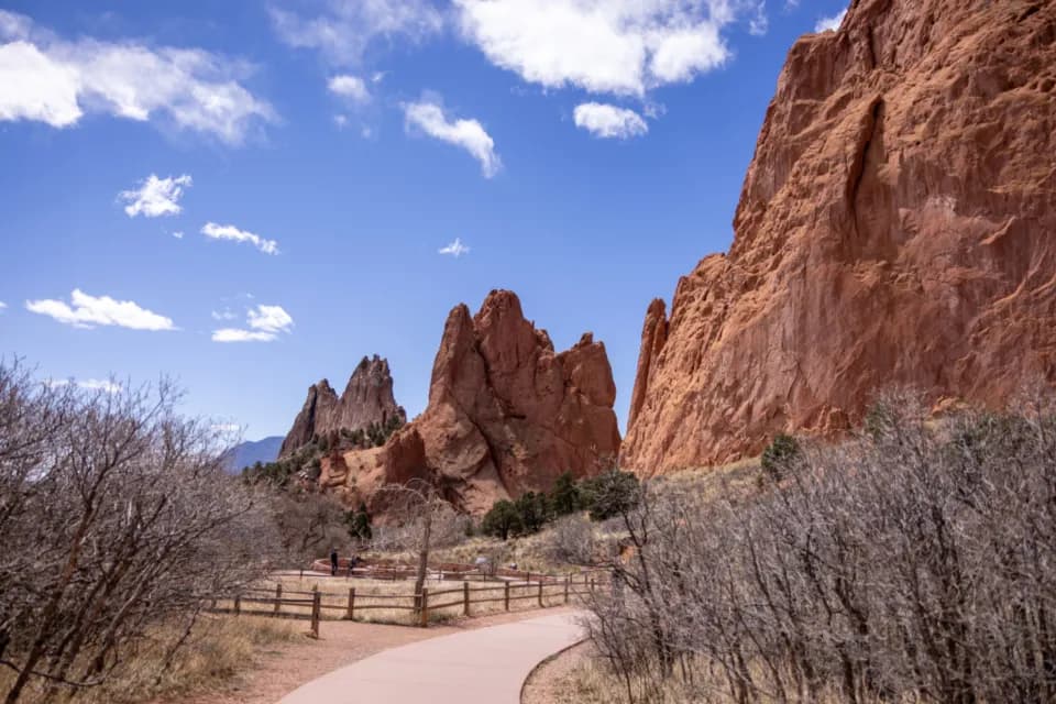 Red rock formations below the Rocky Mountains